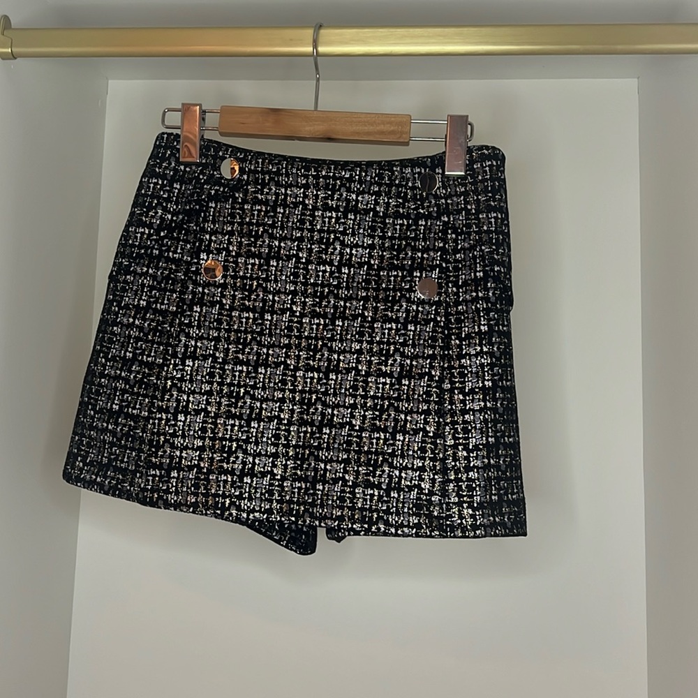 Metallic woman’s skort perfect for the Holiday season.